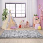 A plush 2x6 feet AROGAN runner rug in grey and white with a textured rainbow pattern, suitable for a child's room.