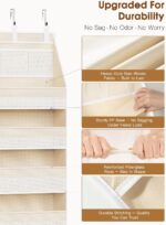 Beige Criusia over the door organizer with 6 deep shelves and 13 mesh pockets, hanging on a white door.