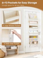 Beige Criusia over the door organizer with 6 deep shelves and 13 mesh pockets, hanging on a white door.