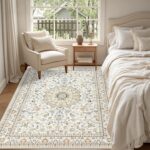 ExpediX 5x7 beige area rug with a vintage medallion pattern, soft texture, and non-slip backing, placed in a living room.