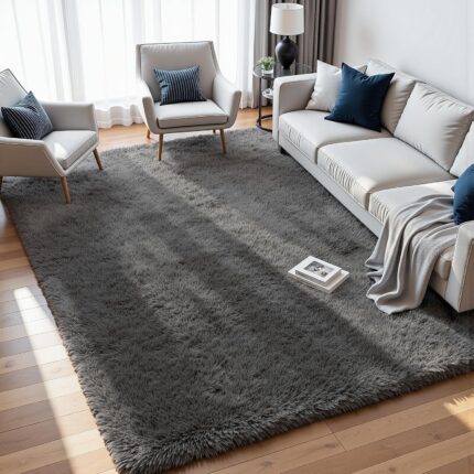 An 8x10 rectangular Fuzziness grey fluffy shag area rug with a modern tie-dye pattern on a living room floor.
