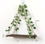 A set of two JOPSTDI White Flower floating triangle shelves with artificial ivy and LED lights, mounted on a wall.