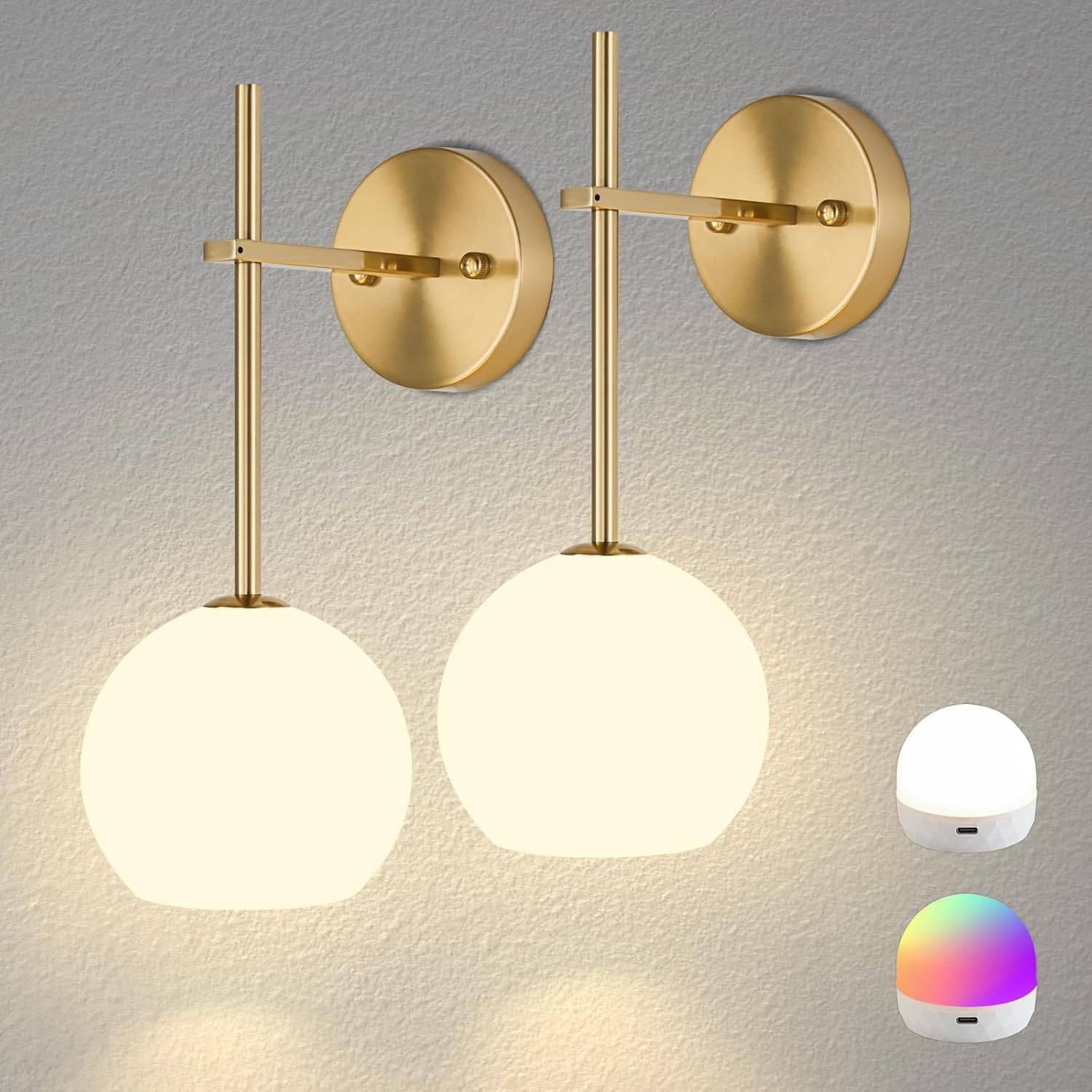 keep-shinning-gold-wireless-wall-sconces-set-of-2-dimmable-rgb-led-lamps-01 Two gold battery-operated wall sconces with milky white frosted glass shades mounted on a wall, illuminated with a warm glow.