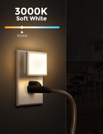 Two L LOHAS LED square plug-in night lights with a glossy white finish, emitting a soft glow.