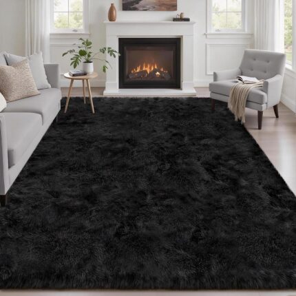 A luxurious black fluffy shag area rug, 5x7 feet, with a thick, soft pile, perfect for a living room or bedroom.