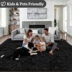 A luxurious black fluffy shag area rug, 5x7 feet, with a thick, soft pile, perfect for a living room or bedroom.