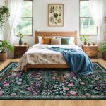 A dark green 8x10 area rug with a vintage floral pattern, suitable for a living room or bedroom.