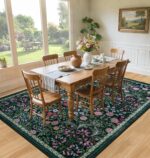 A dark green 8x10 area rug with a vintage floral pattern, suitable for a living room or bedroom.