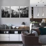 Three vertical panels of TYTAUPT black and white foggy forest canvas art, each 12x16 inches, hanging on a wall