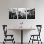 Three vertical panels of TYTAUPT black and white foggy forest canvas art, each 12x16 inches, hanging on a wall