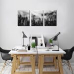Three vertical panels of TYTAUPT black and white foggy forest canvas art, each 12x16 inches, hanging on a wall